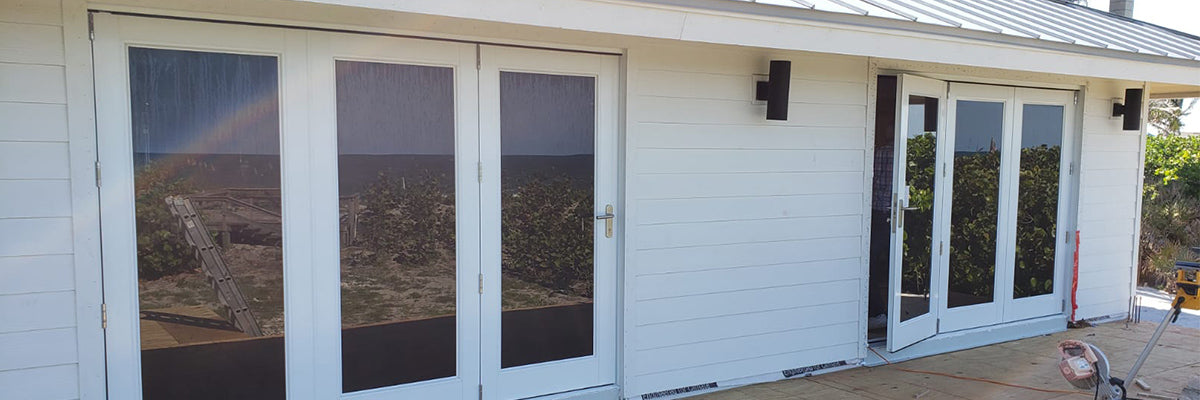 Florida Keys house with multi-fold impact resistant full view air master doors
