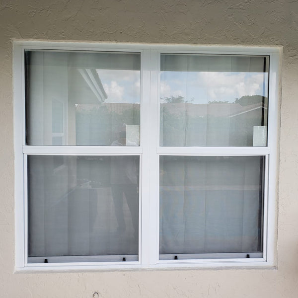 2 single hung hurricane windows side by side