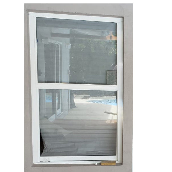 single hung vertical sliding hurricane windows installed in South Florida home