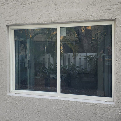 horizontal sliding impact window exterior view on site installation