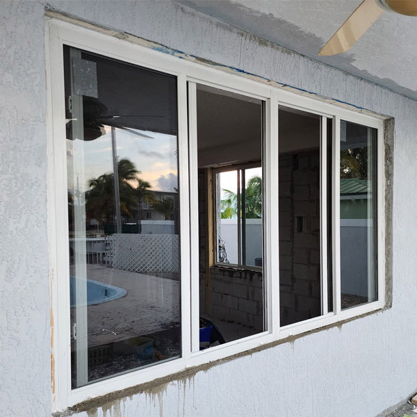 4 pane horizontal sliding impact windows on site 